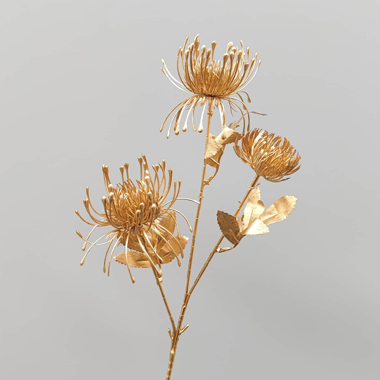 Gold artificial flower arrangement gold leaves gold color faux flower 